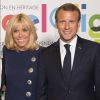 Le président de la République française Emmanuel Macron et sa femme la Première Dame Brigitte Macron (Trogneux) lors de l'inauguration de l'exposition Israel@Lights à Paris, France, le 5 juin 2018.