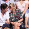 Alain-Fabien Delon et Kiera Chaplin dans les tribunes lors des internationaux de France de Roland Garros à Paris le 7 juin 2018. © Cyril Moreau / Bestimage
