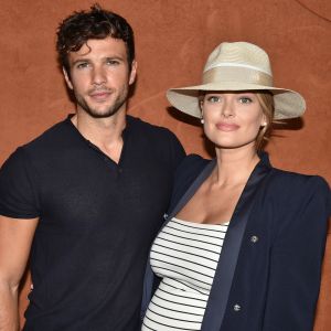 Caroline Receveur (enceinte) et Hugo Philip - People au bar Magnum lors des Internationaux de France de Tennis de Roland Garros à Paris. Le 9 juin 2018 © Veeren / Bestimage