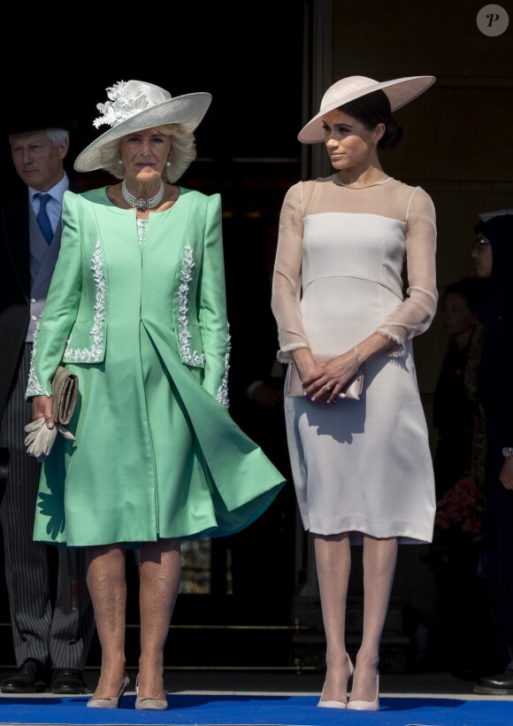 Camilla Parker Bowles, duchesse de Cornouailles, Meghan Markle, duchesse de Sussex lors de la garden party pour les 70 ans du prince Charles au palais de Buckingham à Londres. Le 22 mai 2018.