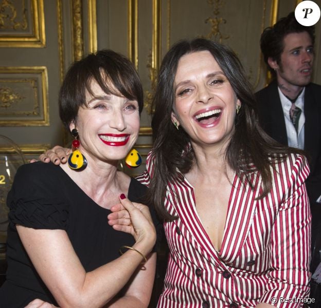 Kristin Scott Thomas et Juliette Binoche - Défilé Giorgio Armani Privé, collection Haute Couture automne-hiver 2018/19 à Paris, le 3 juillet 2018.