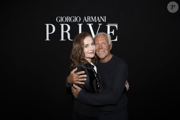Isabelle Huppert et Giorgio Armani - Défilé Giorgio Armani Privé, collection Haute Couture automne-hiver 2018/19 à Paris, le 3 juillet 2018.