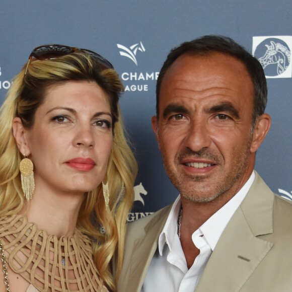 Exclusif - L'animateur Nikos Aliagas et sa femme Tina Grigoriou - Photocall du Longines Paris Eiffel Jumping au Champ de Mars à Paris le 7 juillet 2018. ©Veeren-Perusseau/Bestimage