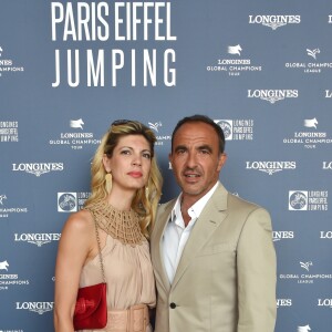 Exclusif - Nikos Aliagas et sa femme Tina Grigoriou - Photocall du Longines Paris Eiffel Jumping au Champ de Mars à Paris le 7 juillet 2018. ©Veeren-Perusseau/Bestimage