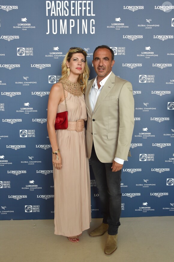 Exclusif - Nikos Aliagas et sa femme Tina Grigoriou - Photocall du Longines Paris Eiffel Jumping au Champ de Mars à Paris le 7 juillet 2018. ©Veeren-Perusseau/Bestimage
