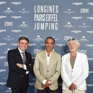 Exclusif - Nikos Aliagas entre Juan-Carlos Capelli et Hugues Aufray - Photocall du Longines Paris Eiffel Jumping au Champ de Mars à Paris le 7 juillet 2018. ©Veeren-Perusseau/Bestimage