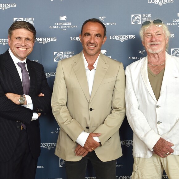 Exclusif - Nikos Aliagas entre Juan-Carlos Capelli et Hugues Aufray - Photocall du Longines Paris Eiffel Jumping au Champ de Mars à Paris le 7 juillet 2018. ©Veeren-Perusseau/Bestimage