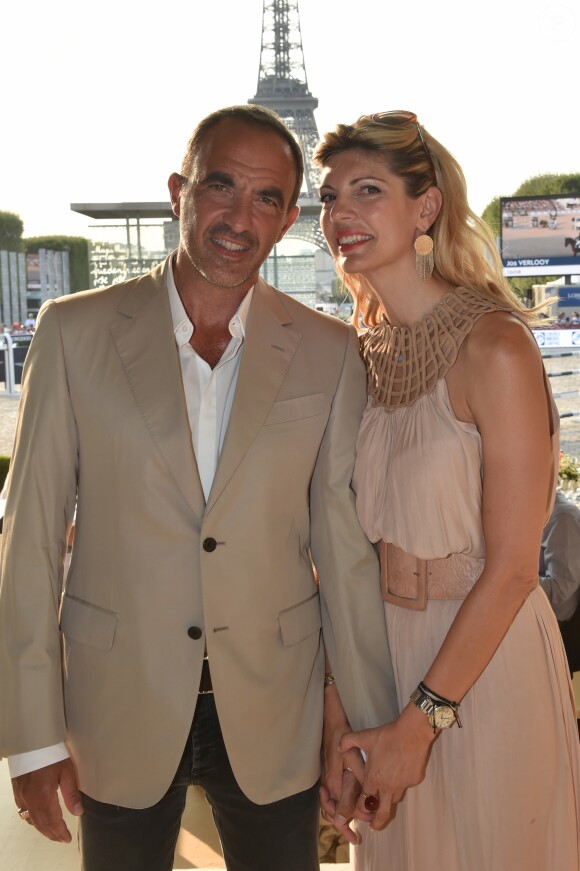 Exclusif - Nikos Aliagas et sa femme Tina Grigoriou - People lors du Longines Paris Eiffel Jumping au Champ de Mars à Paris le 7 juillet 2018. © Perusseau/Veeren/Bestimage