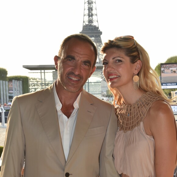 Exclusif - Nikos Aliagas et sa femme Tina Grigoriou - People lors du Longines Paris Eiffel Jumping au Champ de Mars à Paris le 7 juillet 2018. © Perusseau/Veeren/Bestimage