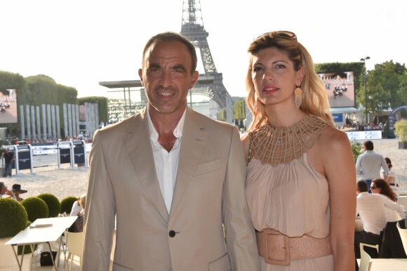 Exclusif - Nikos Aliagas et sa femme Tina Grigoriou - People lors du Longines Paris Eiffel Jumping au Champ de Mars à Paris le 7 juillet 2018. © Perusseau/Veeren/Bestimage