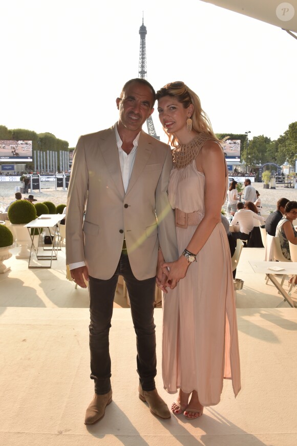 Exclusif - Nikos Aliagas et sa femme Tina Grigoriou - People lors du Longines Paris Eiffel Jumping au Champ de Mars à Paris le 7 juillet 2018. © Perusseau/Veeren/Bestimage