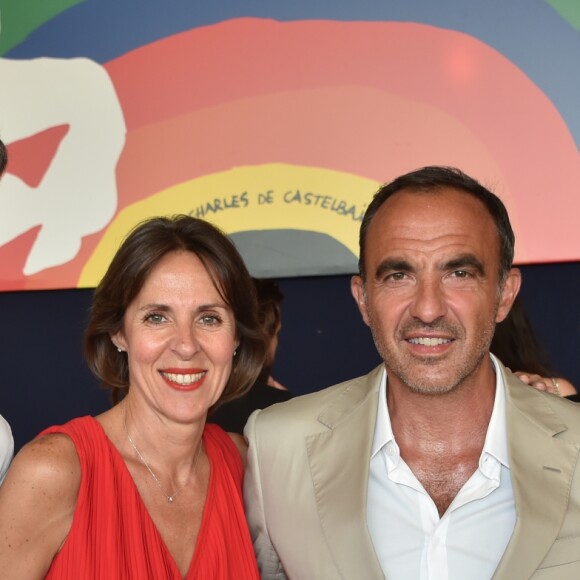 Exclusif - Guest, Nikos Aliagas et sa femme Tina Grigoriou - People lors du Longines Paris Eiffel Jumping au Champ de Mars à Paris le 7 juillet 2018. © Perusseau/Veeren/Bestimage