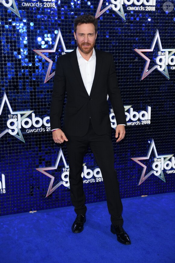 David Guetta au photocall des "Global Awards 2018" à Londres, le 1er mars 2018.