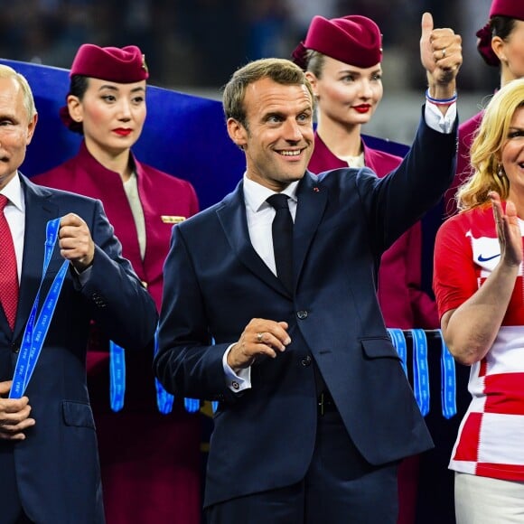 Vladimir Poutine, le président Emmanuel Macron et la présidente Croate Kolinda Grabar-Kitarovic - Finale de la Coupe du Monde de Football 2018 en Russie à Moscou, opposant la France à la Croatie (4-2) le 15 juillet 2018 © Moreau-Perusseau / Bestimage Final of the 2018 Football World Cup in Russia in Moscow, opposing France to Croatia (4-2) on July 15, 2018 - Finale de la Coupe du Monde de Football 2018 en Russie à Moscou, opposant la France à la Croatie (4-2) le 15 juillet 2018 © Moreau-Perusseau / Bestimage