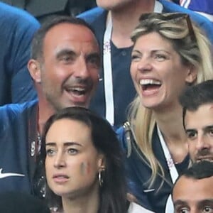 Nikos Aliagas et sa compagne Tina Grigoriou, Omar Sy - People au stade Loujniki lors de la finale de la Coupe du Monde de Football 2018 à Moscou, opposant la France à la Croatie à Moscou le 15 juillet 2018 .© Cyril Moreau/Bestimage