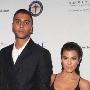 Younes Bendjima et sa compagne Kourtney Kardashian à la soirée caritative The Syrian American Medical Society à l'hôtel The Sofitel à Los Angeles, le 4 mai 2018.