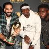 Steven Nzonzi, Adil Rami, Paul Pogba et Samuel Umtiti posent avec le trophée de la Coupe du monde FIFA 2018 - People lors de la soirée 'Maxim Hot 100' dans la salle de spectacle Hollywood Paladium à Los Angeles, le 21 juillet 2018.