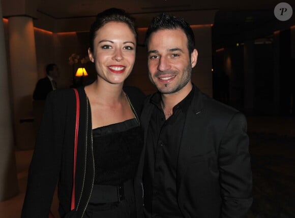 Dounia Coesens et Mario Barravecchia (Star Academy 1) - Sortie des artistes apres la remise des Prix Romy Schneider et Patrick Dewaere a l'hotel Hyatt a Paris, le 11 mars 2013.