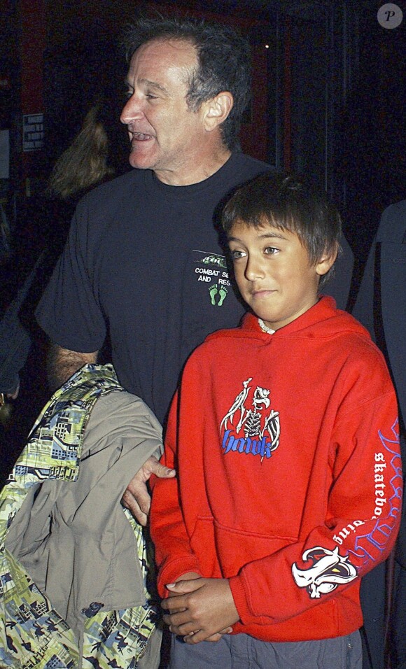 Robin Williams et son fils en 2002 à New York.