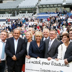 Fabien Onteniente, Michel Platini, la secrétaire d'Etat chargée des Personnes handicapées Sophie Cluzel, la Première Dame Brigitte Macron, la ministère des Sports Roxana Maracineanu - La Première Dame donne le coup d'envoi du match de football caritatif au profit de la fondation Pierre Deniker opposant le Variétés Club de France à l'équipe de France des Parlementaires au Stade de France à Saint-Denis, Seine Saint-Denis, France, le 12 septembre 2018. Brigitte Macron a reçu deux maillots floqués de son nom et celui du président. © Dominique Jacovides/Bestimage