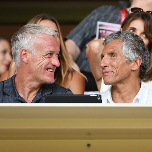 Didier Deschamps et Nagui durant le Match de football de Ligue 1 opposant Monaco à Lille au stade Louis II le 18 août 2018. Pour leur première rencontre à domicile de la saison 2018/2019, les monégasques n'ont obtenu qu'un match nul 0 - 0.1