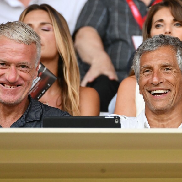 Didier Deschamps, Nagui, leurs femmes au second rang Mélanie Page, Claude Deschamps et des amis durant le Match de football de Ligue 1 opposant Monaco à Lille au stade Louis II le 18 août 2018.