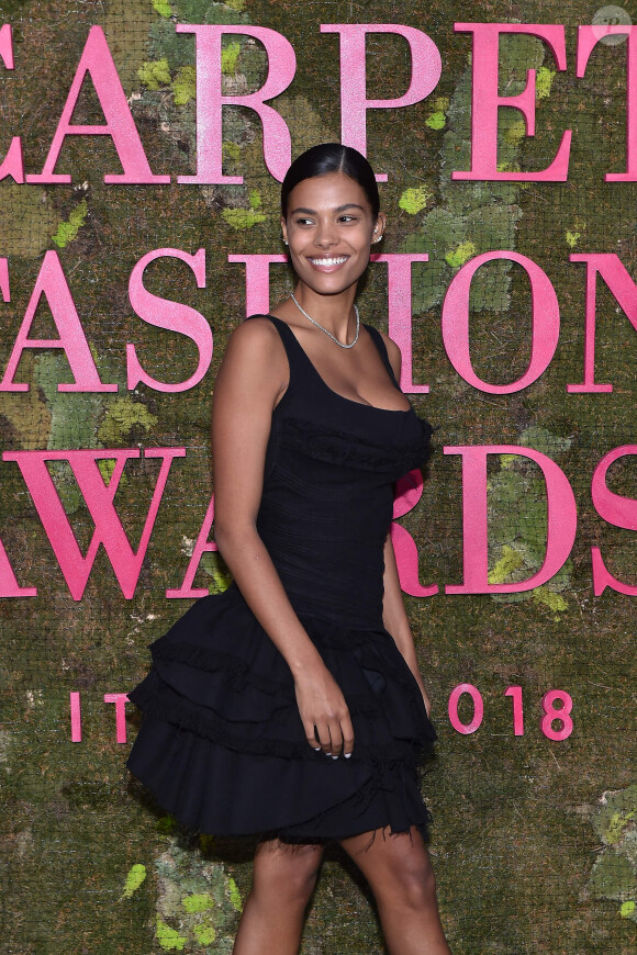 Tina Kunakey lors de la soirée des Green Carpet Fashion Awards au théâtre La Scala à Milan, Italie, le 23 septembre 2018.