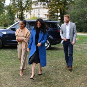 Meghan Markle, duchesse de Sussex, le prince Harry et Doria Ragland, mère de Meghan, lors d'une réception au palais de Kensington en l'honneur des auteures du livre de recettes Together, le 20 septembre 2018 à Londres.