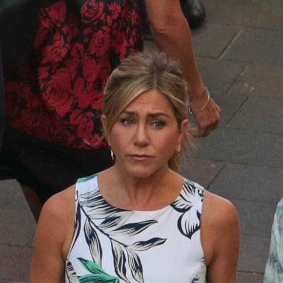 Les acteurs américains Jennifer Aniston et Adam Sandler sur le tournage du film Netfix "Murder Mystery" à Milan, Italie, le 27 août 2018.