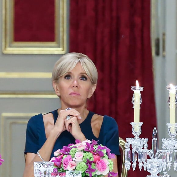 La Première Dame Brigitte Macron - Le président de la République française, sa femme la Première Dame, le président de la République de Corée du Sud et sa femme lors du dîner d'Etat au palais de l'Elysée à Paris, France, le 15 octobre 2018. © Stéphane Lemouton/Bestimage