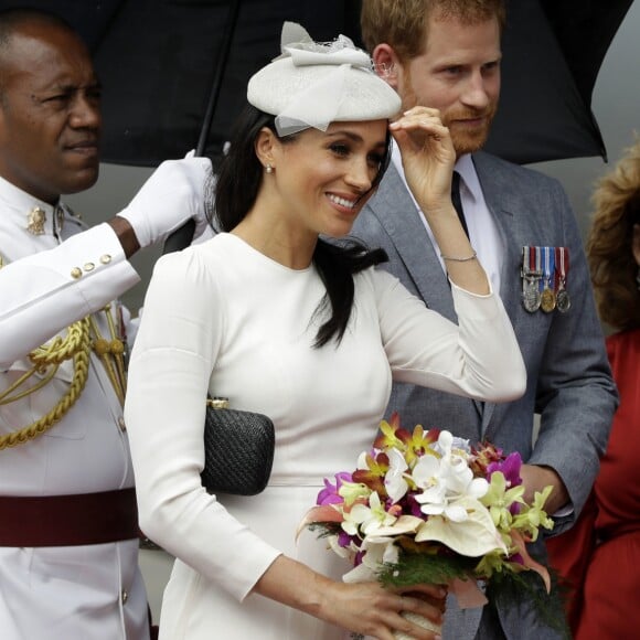 Meghan Markle et le prince Harry lors de leur arrivée à Suva, aux îles Fidji, le 23 octobre 2018.