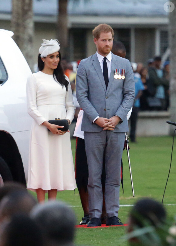 Le prince Harry, duc de Sussex et sa femme Meghan Markle, duchesse de Sussex (enceinte) lors d'une cérémonie aux îles Fidji dans le cadre de leur voyage officiel, le 23 octobre 2018.
