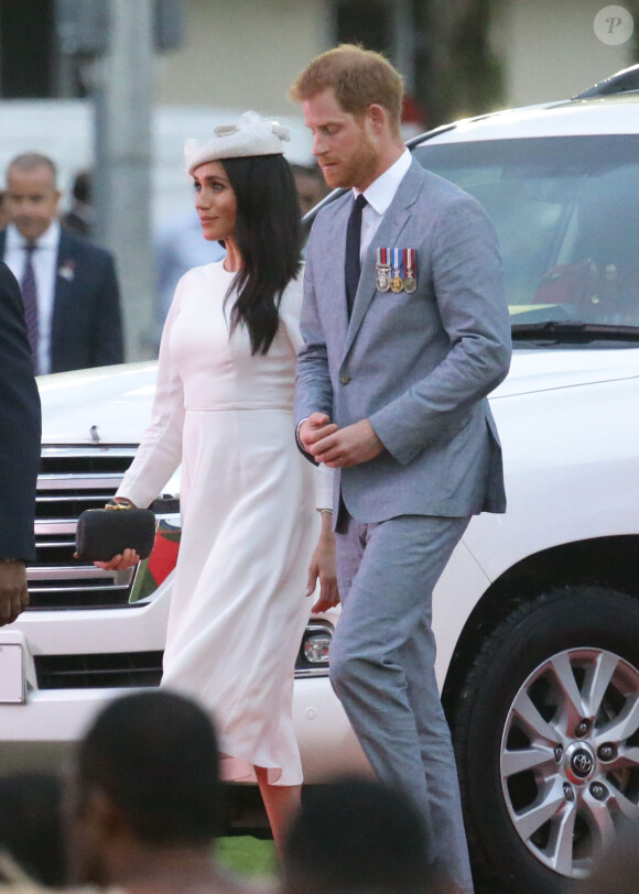 Le prince Harry, duc de Sussex et sa femme Meghan Markle, duchesse de Sussex (enceinte) lors d'une cérémonie aux îles Fidji dans le cadre de leur voyage officiel, le 23 octobre 2018.