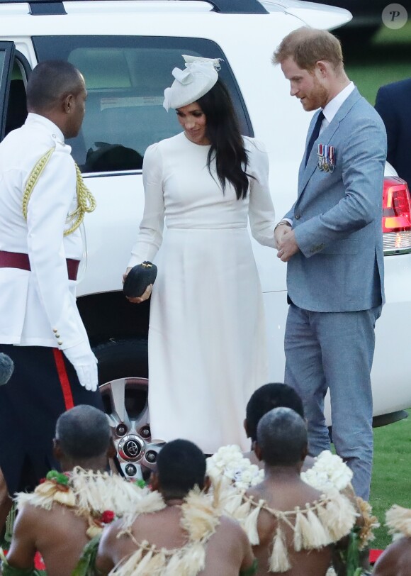 Le prince Harry, duc de Sussex et sa femme Meghan Markle, duchesse de Sussex (enceinte) lors d'une cérémonie aux îles Fidji dans le cadre de leur voyage officiel, le 23 octobre 2018.
