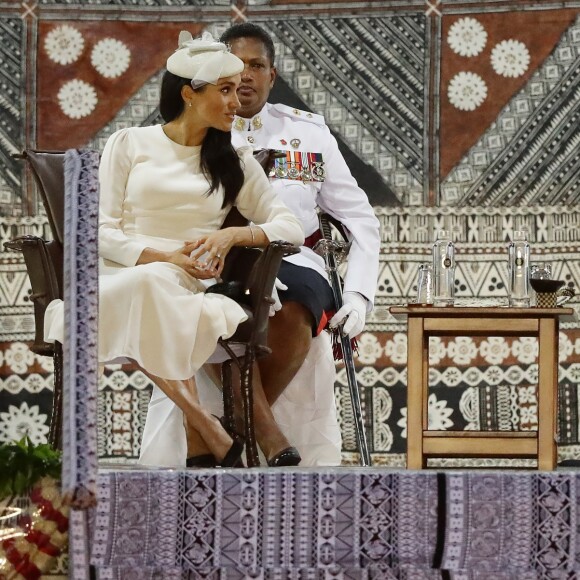 Le prince Harry, duc de Sussex et sa femme Meghan Markle, duchesse de Sussex (enceinte) lors d'une cérémonie aux îles Fidji dans le cadre de leur voyage officiel, le 23 octobre 2018.