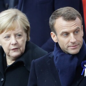 La chancelière allemande Angela Merkel, le président de la République française Emmanuel Macron et sa femme la Première Dame Brigitte Macron (Trogneux) - Cérémonie internationale du centenaire de l'Armistice du 11 novembre 1918 à l'Arc de Triomphe à Paris, France, le 18 novembre 2018.