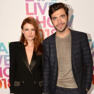 Elodie Frégé et son compagnon Gian Marco Tavani  - Photocall du "Etam Live Show 2018" aux Beaux-Arts à Paris, le 25 septembre 2018. © Rachid Bellak/Bestimage