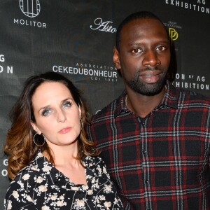 Omar Sy et sa femme Hélène au vernissage de l'exposition "Vision by AG", au profit de l'association caritative CeKeDuBonheur, à la Piscine Molitor à Paris, le 30 novembre 2016. © Guirec Coadic/Bestimage