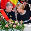 La Première Dame Brigitte Macron et le roi Philippe de Belgique pendant le banquet d'État au château de Laeken à Bruxelles, Belgique, le 19 novembre 2018, lors de la visite d'Etat du couple présidentiel en Belgique.