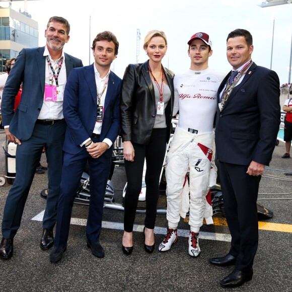 Charlene de Monaco est allée à la rencontre de Charles Leclerc au Grand Prix d'Abu Dhabi le 25 novembre 2018.