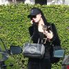Exclusif - Paris Hilton à la sortie d'un salon de coiffure avec son petit chien Diamond baby dans les bras à Los Angeles, le 27 novembre 2018.