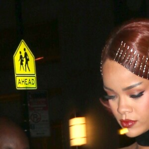 La chanteuse Rihanna, vêtue d'une blouse noire transparente, arrive à l'after party du gala du MET à New York. Le 4 mai 2015