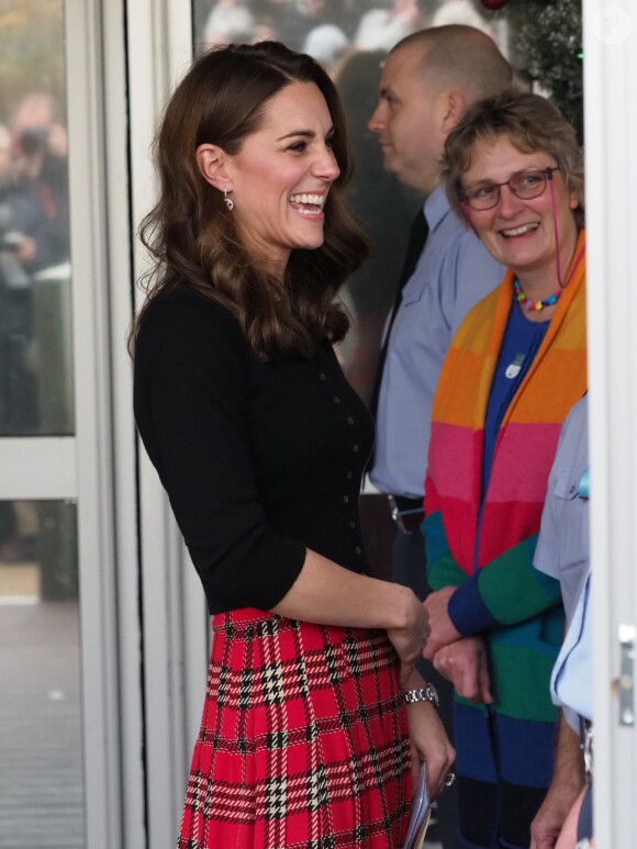Le prince William, duc de Cambridge, et Catherine Kate Middleton, duchesse de Cambridge, arrivent à une fête de Noël pour le personnel de la RAF (Royal Air Force) Coningsby et Marham à Londres le 4 décembre 2018.