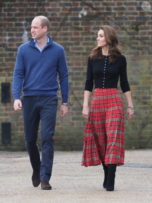Le prince William, duc de Cambridge, et Catherine Kate Middleton, duchesse de Cambridge, arrivent à une fête de Noël pour le personnel de la RAF (Royal Air Force) Coningsby et Marham à Londres le 4 décembre 2018.