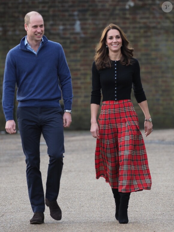 Le prince William, duc de Cambridge, et Catherine Kate Middleton, duchesse de Cambridge, arrivent à une fête de Noël pour le personnel de la RAF (Royal Air Force) Coningsby et Marham à Londres le 4 décembre 2018.