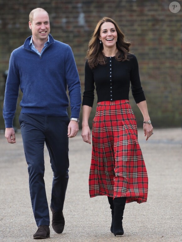 Le prince William, duc de Cambridge, et Catherine Kate Middleton, duchesse de Cambridge, arrivent à une fête de Noël pour le personnel de la RAF (Royal Air Force) Coningsby et Marham à Londres le 4 décembre 2018.