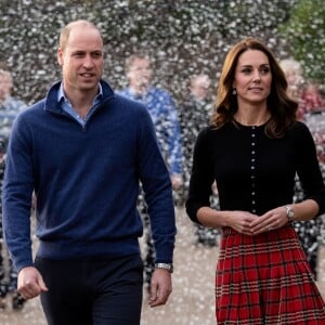 Le prince William, duc de Cambridge, et Catherine Kate Middleton, duchesse de Cambridge, arrivent à une fête de Noël pour le personnel de la RAF (Royal Air Force) Coningsby et Marham à Londres le 4 décembre 2018.