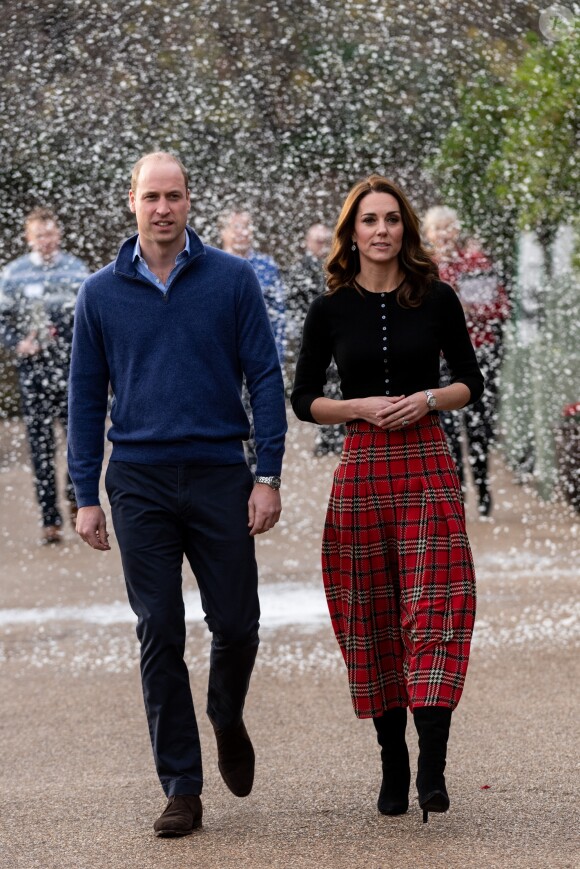 Le prince William, duc de Cambridge, et Catherine Kate Middleton, duchesse de Cambridge, arrivent à une fête de Noël pour le personnel de la RAF (Royal Air Force) Coningsby et Marham à Londres le 4 décembre 2018.