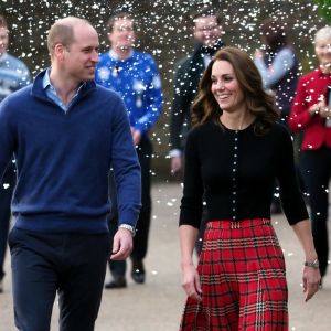 Le prince William, duc de Cambridge, et Catherine Kate Middleton, duchesse de Cambridge, arrivent à une fête de Noël pour le personnel de la RAF (Royal Air Force) Coningsby et Marham à Londres le 4 décembre 2018.