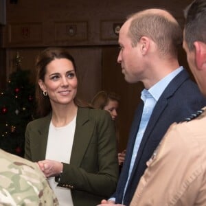 Le prince William et Catherine (Kate) Middleton se rendent sur la base militaire de la Royal Air Force (RAF) d'Akrotiri, à Chypre, pour rencontrer les soldats, les familles résidant sur la base, le personnel de la station et des membres de la communauté locale. Le 5 décembre 2018.